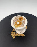 Royal Copenhagen Pendant of porcelain with gold decoration. Designed by Nils Thorson. Sterling Silver by Anton Michelsen