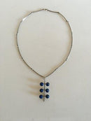 N.E. From Halskette mit Anhänger aus Sterlingsilber und mit Lapislazuli