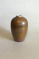 Rorstrand Vase with with Light brown / Golden glaze with green shades. Nice condition