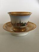 Royal Copenhagen Antike Morgentasse und Untertasse mit handgemaltem Motiv der Börse und der Holmenskirche von 1820-1850.