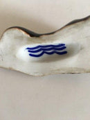 Royal Copenhagen Stentøjs Figur af Lille liggende Budda Dreng. Prøve Glasur