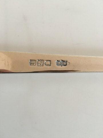 Sæt af to serveringsskeer i Sølv med forgyldt endestykke.