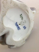 Royal Copenhagen Figur eines Fauns mit Hündchen Nr. 2590