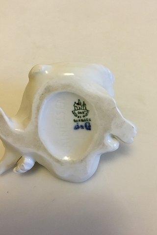 Bing & Grøndahl Blanc de Chine Figur af Havbarn der læner sig op ad fisk No 4037