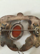 Art Nouveau unika broche fra 1910-1920 med ravsten. Ukendt kunstnermonogram.