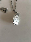 Georg Jensen Årsvedhæng i Sterling Sølv og Rav 2001