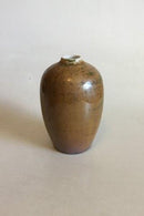 Rorstrand Vase with with Light brown / Golden glaze with green shades. Nice condition