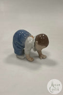 Royal Copenhagen Figur af Kravlende Baby No. 1518
