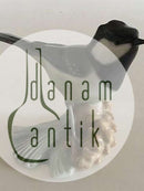 Heubach Figurine af Grøn Spurvefugl på Kogle