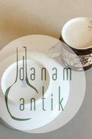 Carl Tielsch / Altwasser Dark brown Mocca cup decorated with flower frieze and gold. From 1875-1909