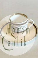 Carl Tielsch / Altwasser Mocca Cup decorated with flower frieze with dragons and gold. From 1875-1909