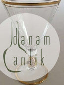 Holmegaard Ida rødvinsglas med guld på stilk, rand og fod. 