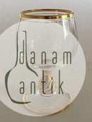 Holmegaard "Ida "干邑杯，杯柄、杯缘和杯底均为金色。 