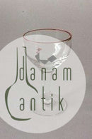 Holmegaard Likørglas dekoreret med sort hane og rød rand.