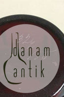 Bordeauxrød vase med gulddekoration