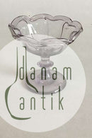 Lille glasopsats af lyslilla glas