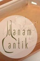 Salt vessel made in light brown glass.