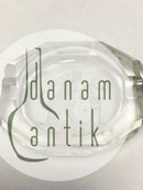 Miniature ashtray in glass.