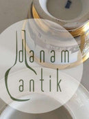 Royal Copenhagen Antike Morgentasse und Untertasse mit handgemaltem Motiv der Börse und der Holmenskirche von 1820-1850.