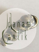 Royal Copenhagen Stentøjs Figur af Lille liggende Budda Dreng. Prøve Glasur