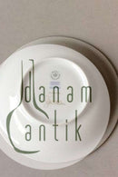 Royal Copenhagen Weihnachtsuntertasse. Entworfen von Jette Frölich 2005