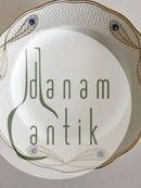 Royal Copenhagen No 118 Dinner Plate w. Golden Peacock Ornament. 24.5cm