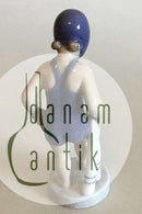 Royal Copenhagen Figurine of Girl, July No 4529