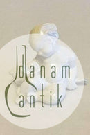 Bing & Grøndahl Blanc de Chine Figur af Havbarn der læner sig op ad fisk No 4037