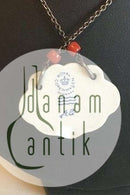 Royal Copenhagen Vedhæng af porcelæn designet af Arje Griegst. Sterling sølv af Anton Michelsen