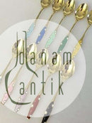 Ein Satz von 10 Kaffeelöffeln aus Silber und Emaille von Frigast