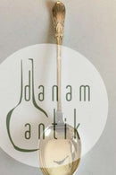 Silberlöffel mit Ornamenten und vergoldetem Löffel