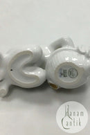 Bing og Grøndahl Blanc de Chine Figur med guld af Havbarn med Konkylie No. 2315