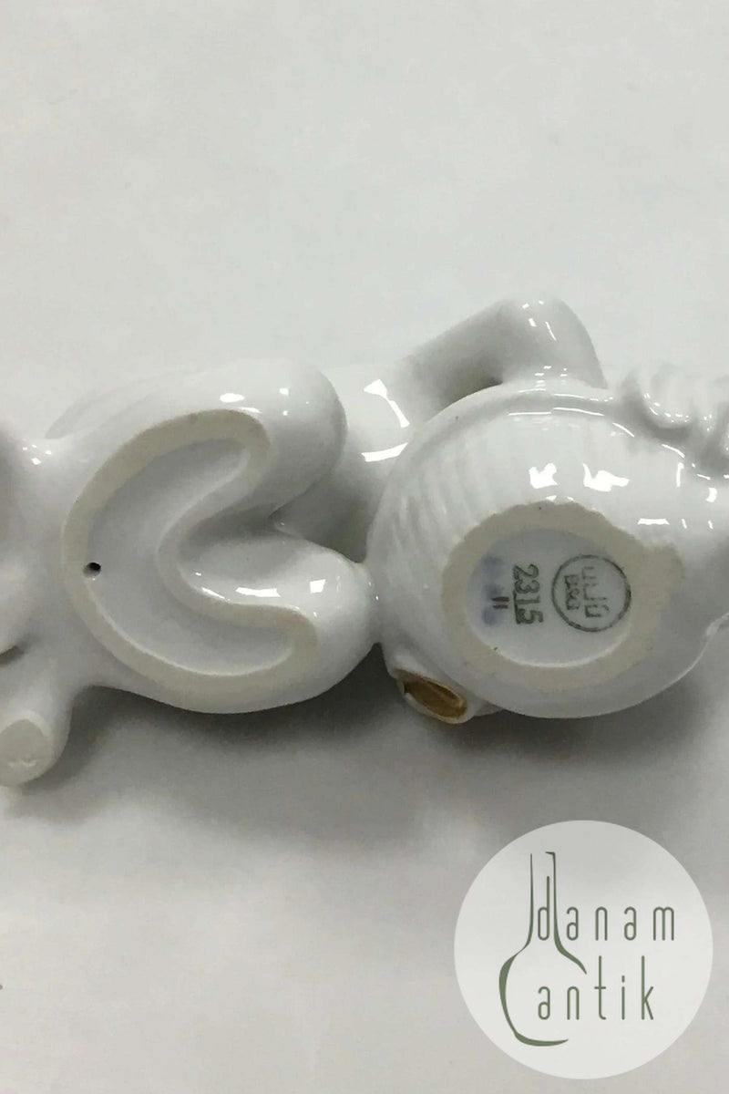 Bing og Grøndahl Blanc de Chine Figur med guld af Havbarn med Konkylie No. 2315