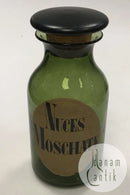 Holmegaard Apotekerflasken, krukke med tekst Nuces Moschatæ fra 1985