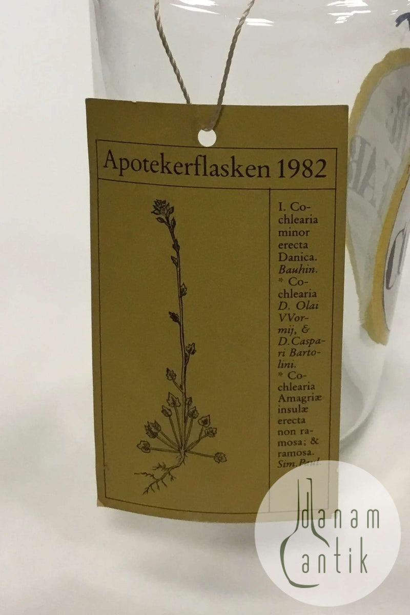 Holmegaard Apotekerflasken, krukke med tekst SPIR COCHLEAR fra 1981