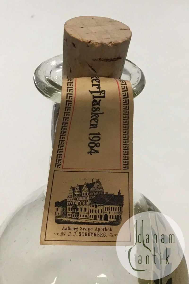 Holmegaard Apotekerflasken, krukke med tekst TR KYOSCYAM fra 1984