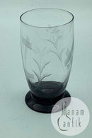 Holmegaard Glasværk: ørneglas eller sodavandsglas på sort fod med slibninger