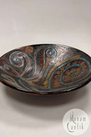 Stentøjsskål i brune, gule og blå nuancer