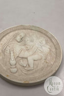 Royal Copenhagen bisque plate: Woman with two children