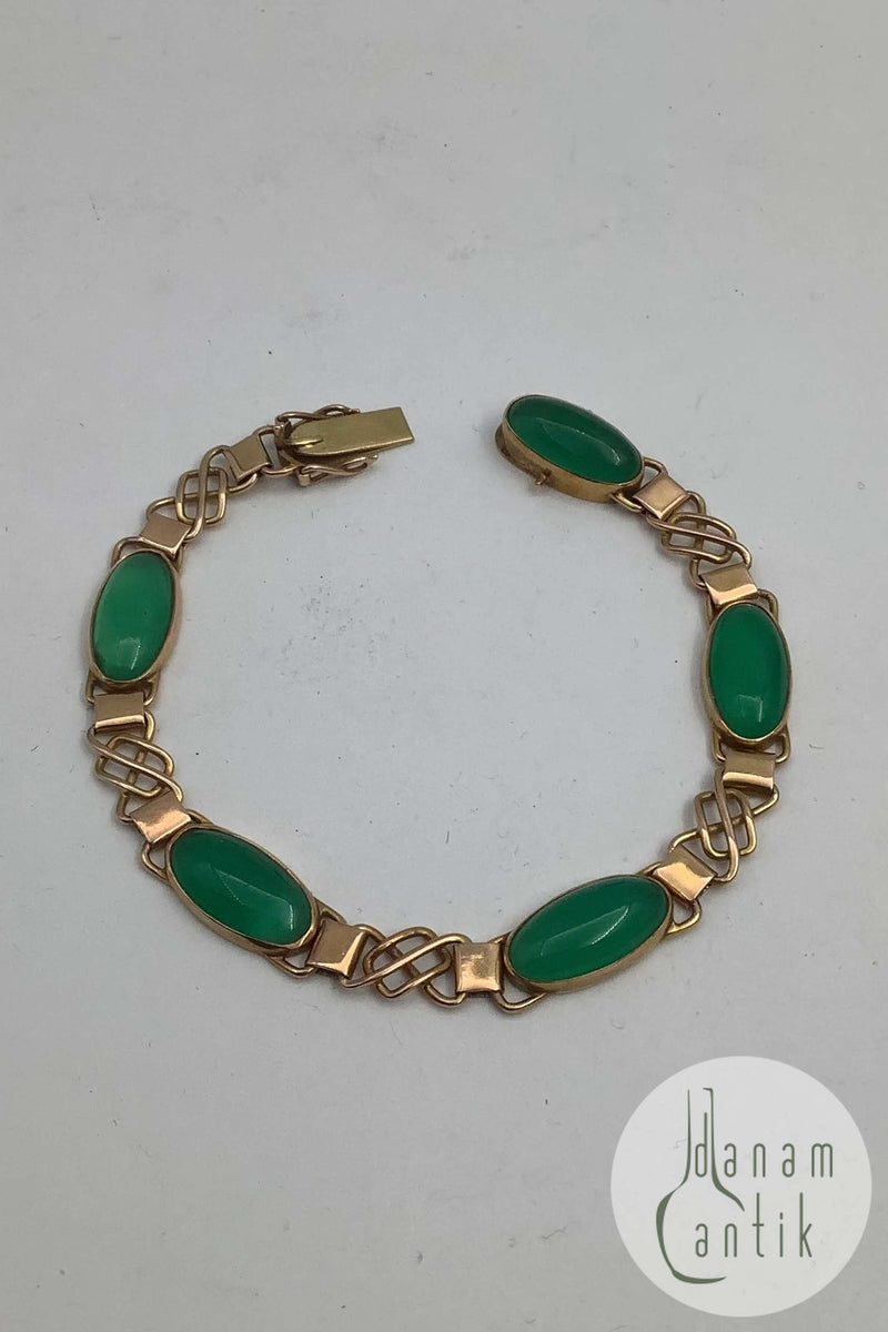 14 karat guld armbånd med grønne sten