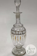 Glaskaraffel med dekoration i guld, hvid og rød