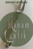 Meat Fork with silver Handle. Pattern looks like Diana.