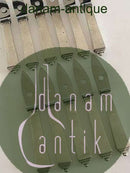 Georg Jensen Pyramidenset mit 11 Austernmessern aus Sterlingsilber und Edelstahl. Mit frühen GJ-Stempeln