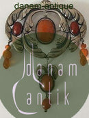 Art Nouveau unika broche fra 1910-1920 med ravsten. Ukendt kunstnermonogram.