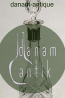 Karaffel i facetslebet krystal glas med sølv krave.