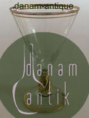 Holmegaard "Ida "酒杯，杯柄、杯缘和杯底均为金色。