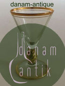 Holmegaard Ida Shot玻璃杯，杯干、杯沿和杯脚都是金色。 