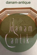 Salt vessel made in light brown glass.