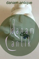 Royal Copenhagen Blanc de Chine Figurine of Baby with flowers