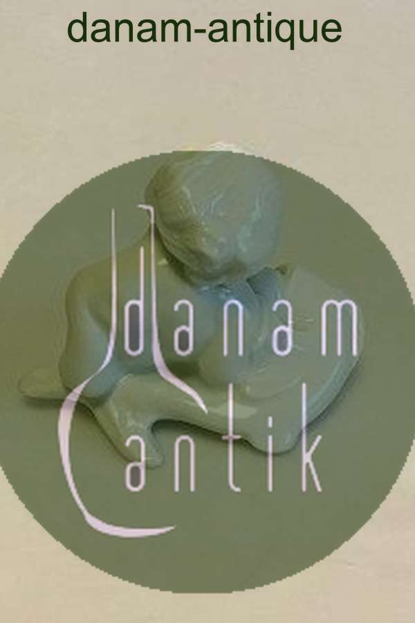 Bing & Grøndahl Blanc de Chine Figur af Havbarn der læner sig op ad fisk No 4037